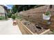 The property offers a lovely garden, perfect for growing herbs and vegetables in raised garden beds at 2835 Olde Town Park Dr, Norcross, GA 30071