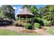 Enjoy the outdoors near the community gazebo surrounded by landscaping and walking paths at 2835 Olde Town Park Dr, Norcross, GA 30071