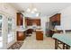 Spacious kitchen with island, stainless appliances, and bright lighting at 2835 Olde Town Park Dr, Norcross, GA 30071