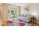 Cozy living room with a bay window and comfortable seating area at 2835 Olde Town Park Dr, Norcross, GA 30071