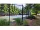 Spend your time playing tennis on the community court, framed by green trees and landscaping at 2835 Olde Town Park Dr, Norcross, GA 30071