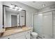 Bathroom with shower, sleek vanity, and granite countertop at 6909 Heritage Pl, Acworth, GA 30102