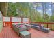 Outdoor deck with comfortable sectional sofa and stylish furniture perfect for entertaining at 6909 Heritage Pl, Acworth, GA 30102