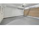 Spacious garage with painted floor and a paneled garage door at 865 Inman Village Ne Pkwy, Atlanta, GA 30307