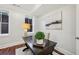 Bright office with a dark wooden desk, hard wood floors, and large windows at 865 Inman Village Ne Pkwy, Atlanta, GA 30307