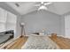 Bedroom featuring hardwood flooring, a large window, and space for relaxing or entertaining at 240 Springbottom Ct, Lawrenceville, GA 30046