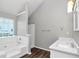 Bathroom with tub, shower, single sink vanity, and vinyl flooring with a window view at 2590 Carolina Rdg, Riverdale, GA 30296