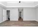 This large bedroom is bright and features hardwood floors and a walk-in closet at 2590 Carolina Rdg, Riverdale, GA 30296