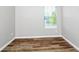 Bedroom with modern flooring and plenty of natural light from the window at 2590 Carolina Rdg, Riverdale, GA 30296