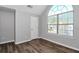 Bedroom featuring vaulted ceilings and large window, providing lots of natural light at 2590 Carolina Rdg, Riverdale, GA 30296