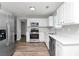 Bright kitchen with stainless steel appliances, sleek counters and cabinets at 2590 Carolina Rdg, Riverdale, GA 30296