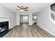 Inviting living room with fireplace, open to dining area and kitchen at 2590 Carolina Rdg, Riverdale, GA 30296