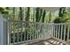 Balcony overlooking lush greenery provides a peaceful outdoor space at 2929 Torreya Se Way, Marietta, GA 30067