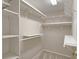 Walk-in closet featuring organized shelving and ample storage space at 2929 Torreya Se Way, Marietta, GA 30067