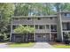 Inviting townhome showcasing attached garages, tidy landscaping, and neutral exterior paint at 2929 Torreya Se Way, Marietta, GA 30067