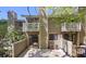 Charming townhome exterior with a fenced patio at 2929 Torreya Se Way, Marietta, GA 30067