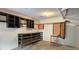 Spacious garage area with storage cabinets and wall mounted shelving unit and drop down work bench at 2929 Torreya Se Way, Marietta, GA 30067
