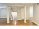Hallway entrance to stairs, hardwood floors, neutral color scheme and access to downstairs area at 2929 Torreya Se Way, Marietta, GA 30067