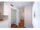 Pantry and hallway, hardwood floors, and access to other parts of the house and rooms at 2929 Torreya Se Way, Marietta, GA 30067