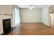 Cozy living room features hardwood floors, a fireplace, large windows, and an open design for entertaining at 2929 Torreya Se Way, Marietta, GA 30067