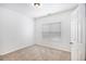 Bright bedroom with neutral carpet and white door and trim at 5658 Greensage Dr, Atlanta, GA 30349