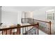 Second story hallway overlooking the kitchen at 5658 Greensage Dr, Atlanta, GA 30349