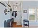 Stylish entryway with hardwood floors, decorative wall accents, and ample storage at 93 Hammock Se Pl, Atlanta, GA 30312