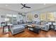 Bright living room with hardwood floors, ample seating, and plenty of natural light at 93 Hammock Se Pl, Atlanta, GA 30312