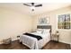 Spare bedroom featuring hardwood floors, a ceiling fan, natural light, and neutral walls at 9640 Cedar Grove Rd, Fairburn, GA 30213