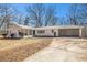 Charming, newly renovated single story home with large front yard and covered two car carport at 9640 Cedar Grove Rd, Fairburn, GA 30213