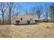 Single-Gathering home with an expansive yard and mature trees at 9640 Cedar Grove Rd, Fairburn, GA 30213