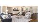 Spacious living room with stylish furnishings and an open layout, great for entertaining at 9640 Cedar Grove Rd, Fairburn, GA 30213