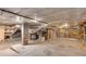 Unfinished basement space with exposed brick, ductwork, and concrete floor, offering potential for customization at 966 Blue Ridge Ne Ave, Atlanta, GA 30306