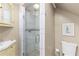 Updated bathroom featuring glass shower doors, neutral tiling, and vanity with great lighting at 966 Blue Ridge Ne Ave, Atlanta, GA 30306