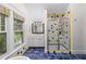Bathroom with a glass-enclosed shower, vanity, and colorful tile details at 966 Blue Ridge Ne Ave, Atlanta, GA 30306