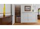 Butler's pantry featuring a wet bar with mini fridge and granite countertop at 966 Blue Ridge Ne Ave, Atlanta, GA 30306