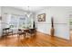 Bright dining room with hardwood floors, large windows and white wainscoting at 966 Blue Ridge Ne Ave, Atlanta, GA 30306