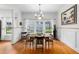 Elegant dining room with white wainscoting, hardwood floors, and ample natural light at 966 Blue Ridge Ne Ave, Atlanta, GA 30306