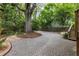 Long brick driveway leading to the home, shaded by mature trees at 966 Blue Ridge Ne Ave, Atlanta, GA 30306