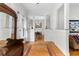 Inviting foyer with hardwood flooring, bench, and views into the dining area at 966 Blue Ridge Ne Ave, Atlanta, GA 30306
