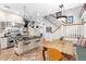 Charming kitchen with a center island, stainless steel appliances, and hanging pot rack above at 966 Blue Ridge Ne Ave, Atlanta, GA 30306