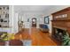 Hardwood floors, built-in shelving, and a cozy fireplace make this living room a stunner at 966 Blue Ridge Ne Ave, Atlanta, GA 30306