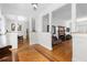 Open-concept living area with hardwood floors, fireplace, and view into a dining room at 966 Blue Ridge Ne Ave, Atlanta, GA 30306