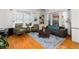 Bright living room featuring a rug, hardwood floors, and comfortable seating at 966 Blue Ridge Ne Ave, Atlanta, GA 30306