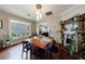 Bright dining room with natural lighting, hardwood floors, and classic fireplace at 1027 Kirkwood Se Ave, Atlanta, GA 30316