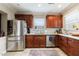 Traditional kitchen featuring stainless steel appliances and granite countertops at 1027 Kirkwood Se Ave, Atlanta, GA 30316