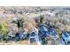 Aerial view showcasing the property nestled among mature trees in a well-established neighborhood at 1456 S Gordon Sw St, Atlanta, GA 30310