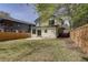 Spacious backyard featuring a manicured lawn and a full wooden fence at 1456 S Gordon Sw St, Atlanta, GA 30310