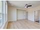 Bright bedroom featuring hardwood floors, a ceiling fan, and a window for plenty of natural light at 1456 S Gordon Sw St, Atlanta, GA 30310