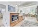 Open-concept kitchen with a marble island, modern appliances, and seamless connection to the dining area at 1456 S Gordon Sw St, Atlanta, GA 30310
